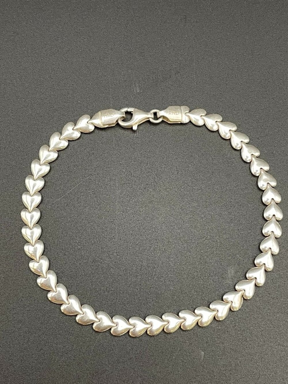 Sterling Silver Linked Hearts Bracelet.